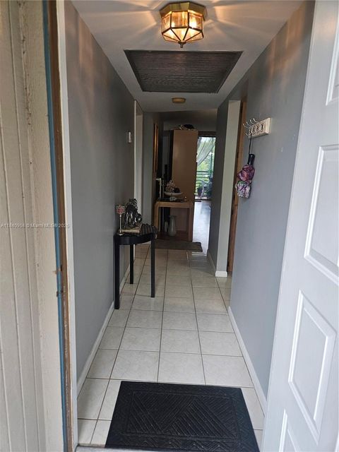 Photo of 901 Colony Point Cir #408, Pembroke Pines, FL 33026 (MLS # A11840958)