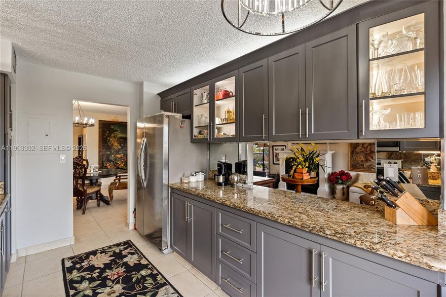 Rarely available 3-bedroom, 2.5-bath residence in the heart of Aventura with impact windows and washer and dryer hook-up ready, ideally located near Williams Island and just minutes from Biscayne Blvd, world-class dining, luxury shopping, and the renowned Aventura Mall. This spacious, expanded floorplan offers 1,610 sq ft of interior living space, enhanced by abundant windows that fill the home with natural light. Designed for both comfort and entertaining, the residence features a fully remodeled kitchen with modern finishes and an open, functional layout. Large pantry and storage room. One of the few units with washer and dryer hook-up. The versatile third bedroom can easily serve as a den, home office, or media room, perfect for today’s flexible lifestyle.
Step outside to an expanded L-shaped balcony, completely remodeled with sleek glass railings, creating a seamless indoor-outdoor experience while showcasing peaceful views of the lake, lush gardens, and tennis courts — an ideal setting for morning coffee or evening relaxation.
Additional highlights include impact windows, generous living areas, and a thoughtfully upgraded layout rarely found in the community. Residents enjoy a gated community with 24/7 security, resort-style amenities including two swimming pools, a brand-new fitness center, and valet service. Experience the best of Aventura condo living, combining location, space, and lifestyle just moments from everything South Florida has to offer.