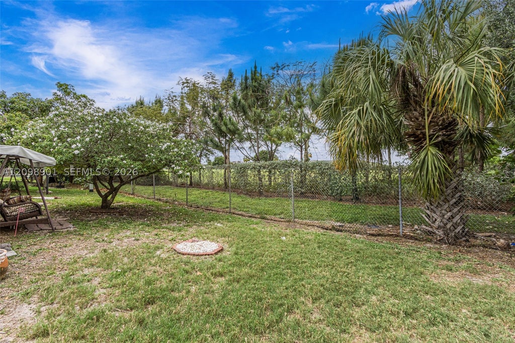 Photo of 4871 NW 13th Ave, Deerfield Beach, FL 33064 (MLS # A12098901)
