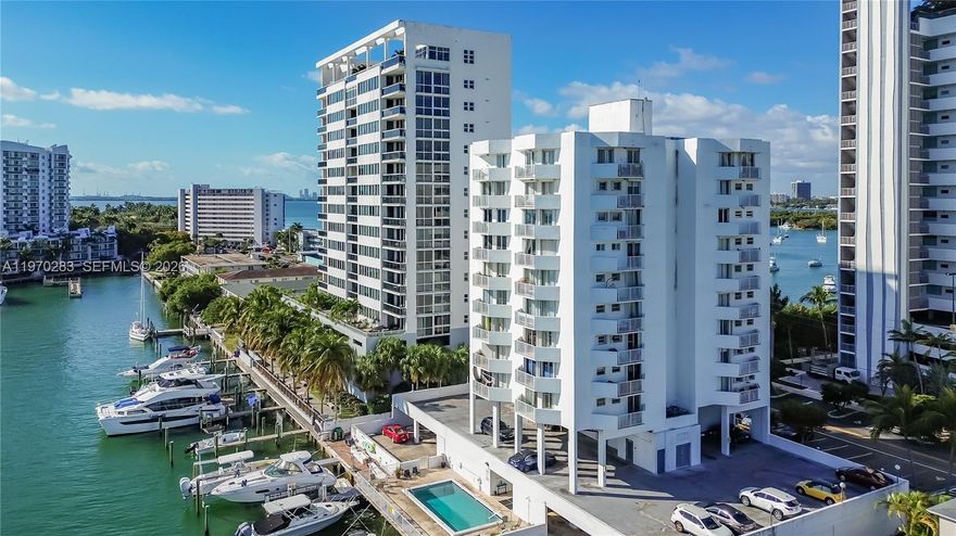 Exclusive corner residence in boutique Magaluf Towers, perfectly situated on a private island in North Bay Village, Miami. Revel in stunning bay views, 2 spacious bedrooms with en-suite baths, and private balconies for each room. The building features a bayfront pool, convenient laundry & trash chutes on every floor, guest parking, and an assigned covered space. Boaters will love the option to own or rent a private dock. Just steps from Publix, dining, and entertainment, this is a rare Miami waterfront opportunity. Easy to show.