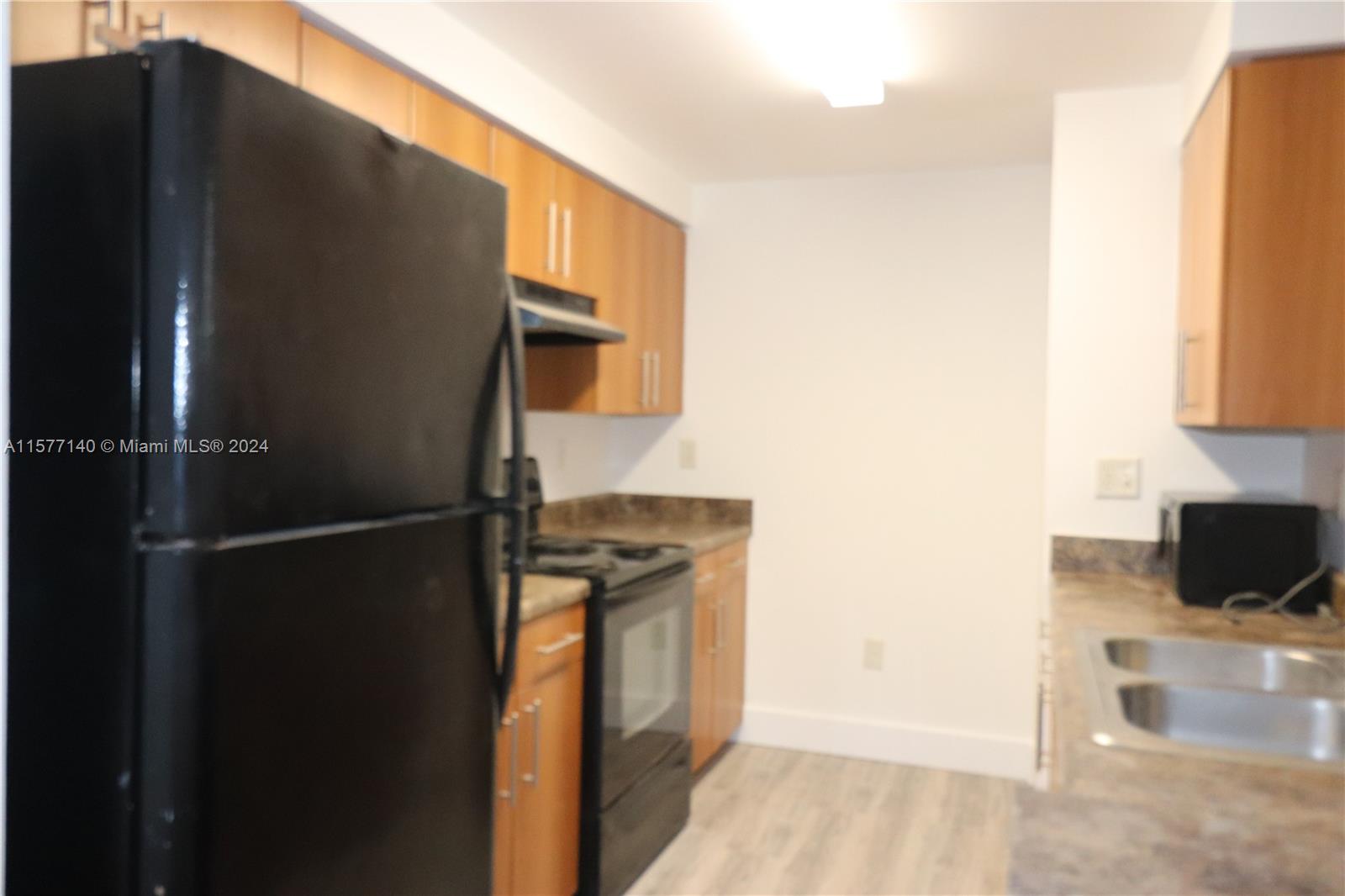 EL-AD POINCIANA CONDO - Residential Lease