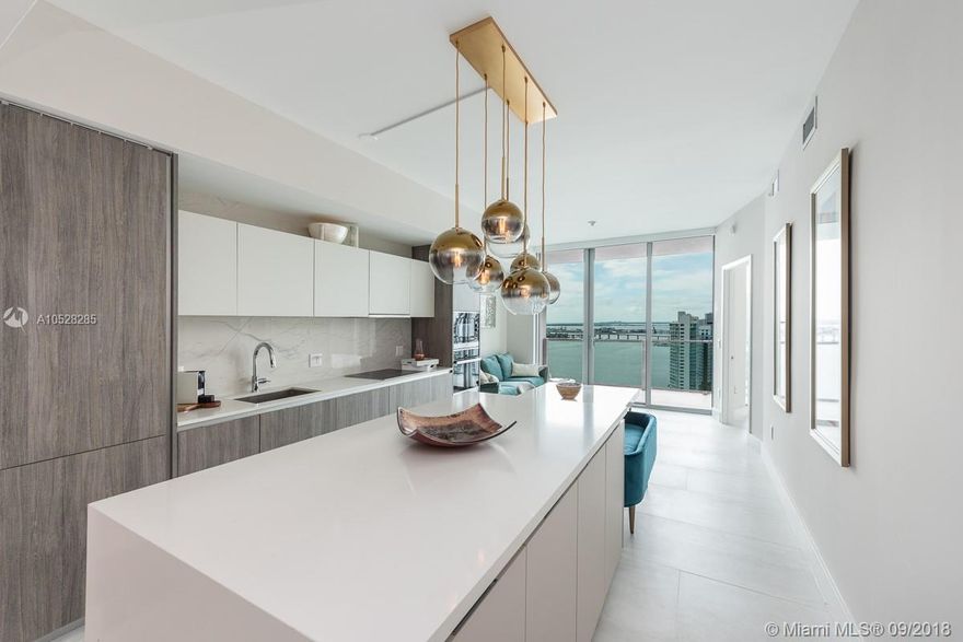 Unobstructed wide Bay Views in the most Luxurious Building in East Edgewater from every Room. FURNISHED  1 Bedroom + DEN and 2 Full Bathrooms. Private Elevator, walk in Closet, MOTORIZED Window Treatments, High Quality Furniture, Kitchen Island Installed. Luxury amenities including 2 pools, cabanas, Beach Club, State of the Art gym, and Spa. Unit comes with 1 Storage. Internet and cable included.