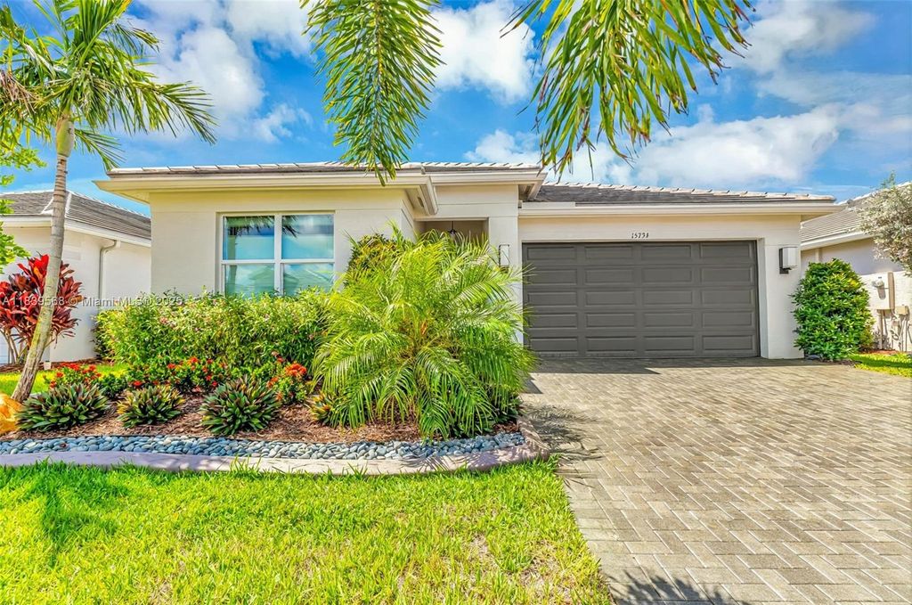 Photo of 15734 SW Egret Coast Dr, Port St Lucie, FL 34987 (MLS # A11839568)