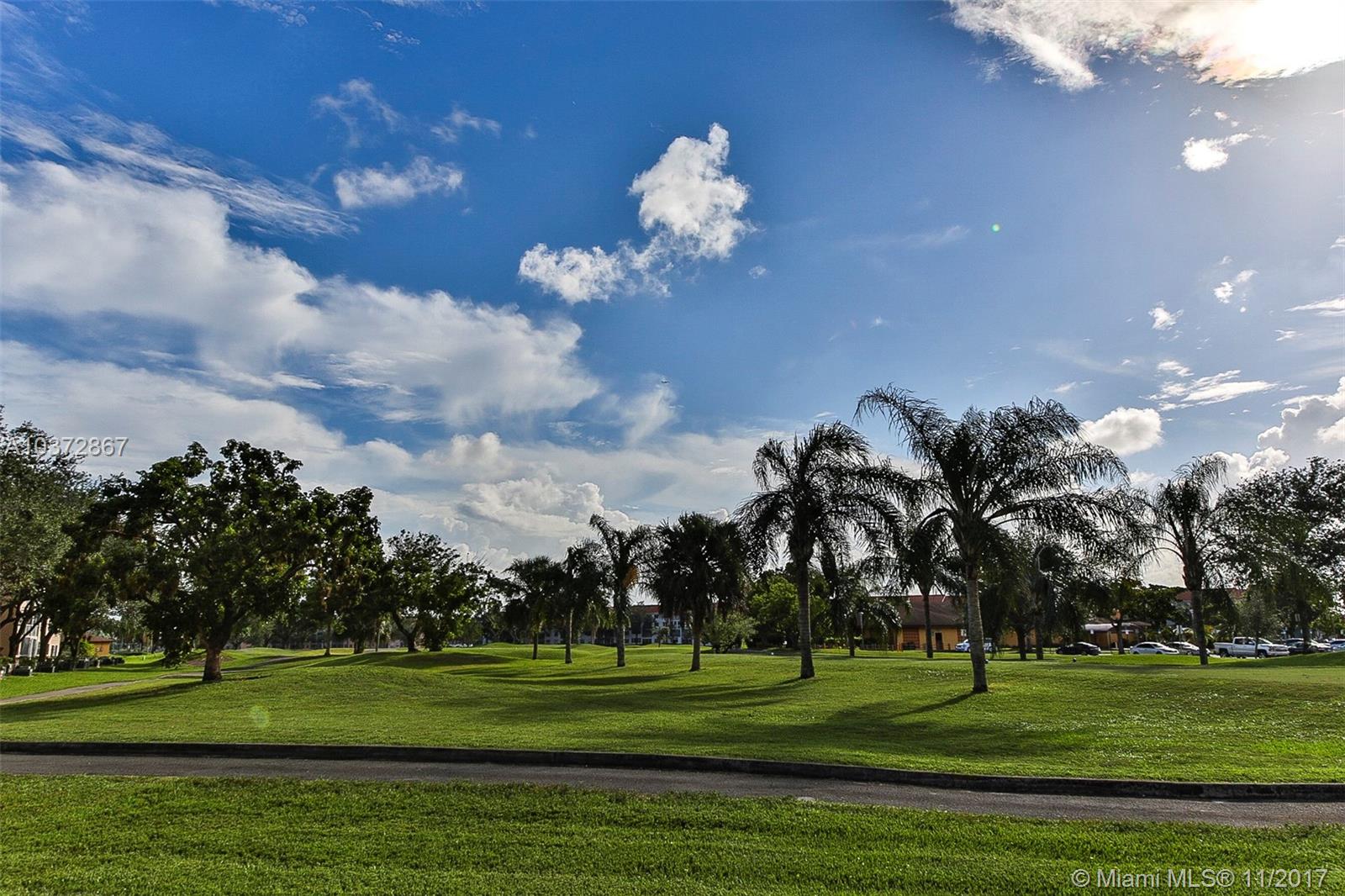 Beautiful, bright and spacious Karanda model at Century Village, Pembroke Pines. This home offers a roomy eat-in kitchen, huge master bedroom with private bathroom and amazing golf course views. Freshly-painted with new carpet in master bedroom and living room. Both bedrooms offer expansive walk-in closets. Unit conveniently located within walking distance of one the multiple pool sites. Washer and dryer in unit. This resort-style community offers many amenities which include a 135,000 sq. ft. clubhouse, fitness center with state-of-the-art exercise equipment and 1042-seat performance theater. Seller motivated - all offers welcome.