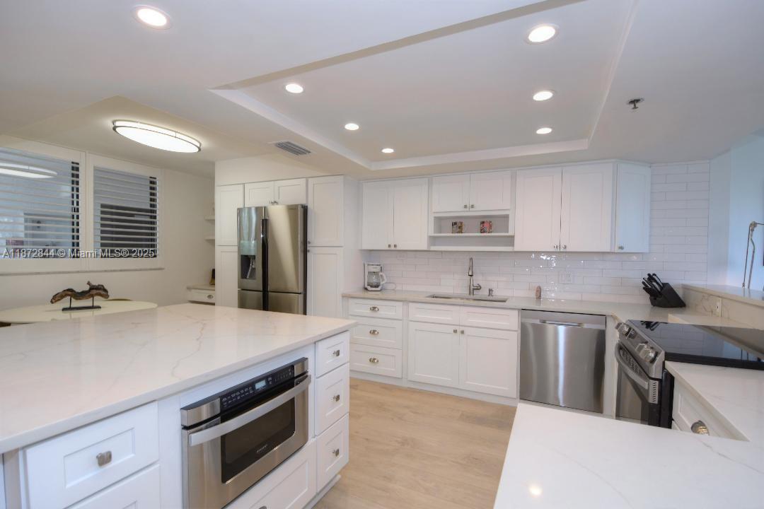 TOWNHOUSES OF HIGHLAND BE - Residential