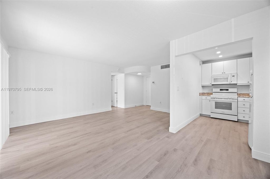 Photo of 4990 E Sabal Palm Blvd #202, Tamarac, FL 33319 (MLS # A11970795)