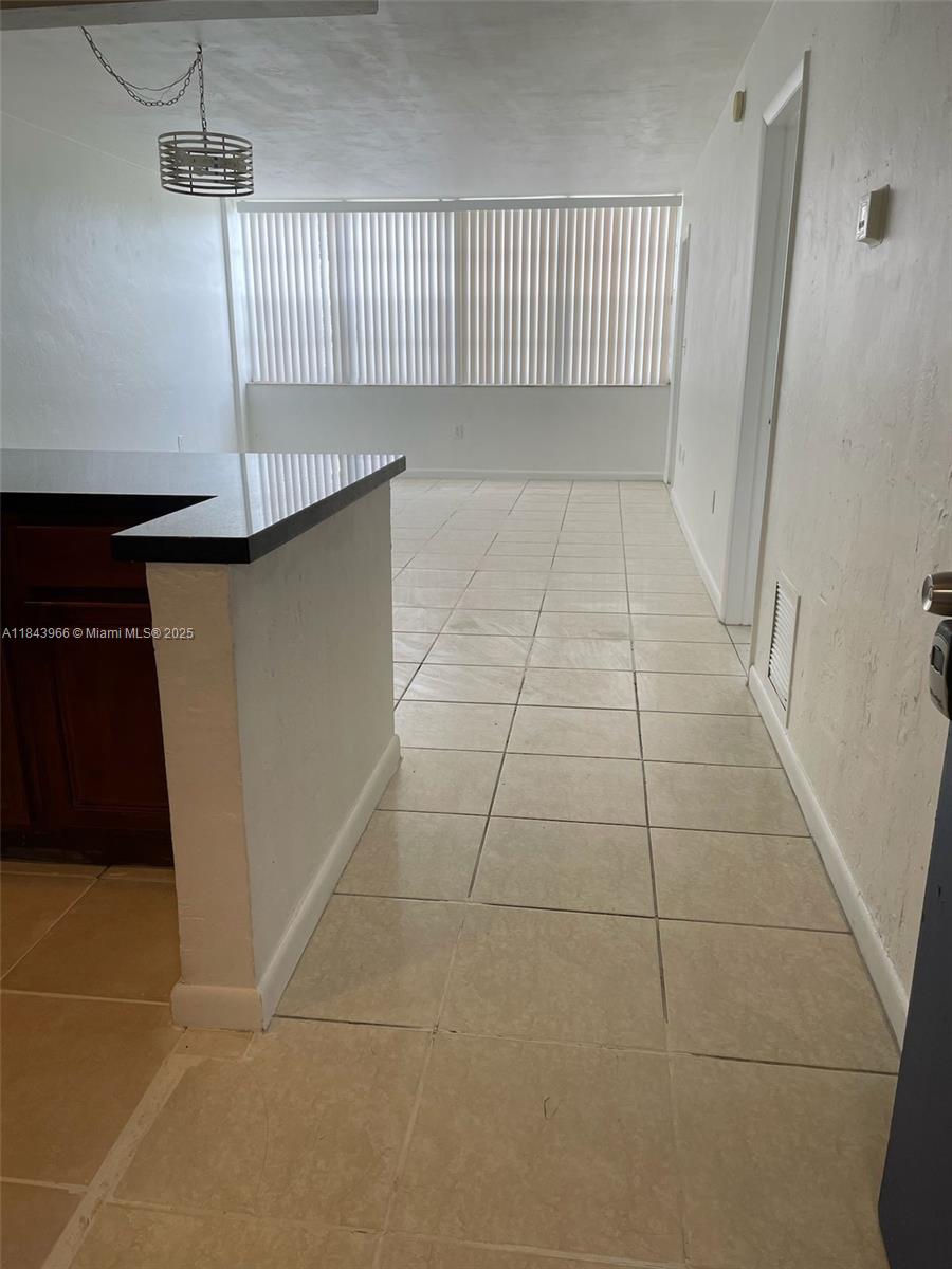 Step into this charming third-floor condo located in the Portalegre community! Offering close to 900 square feet of inviting living space, the unit boasts tile flooring throughout, a generously sized bedroom with a walk-in closet, and an open-concept kitchen equipped with a gas stove.