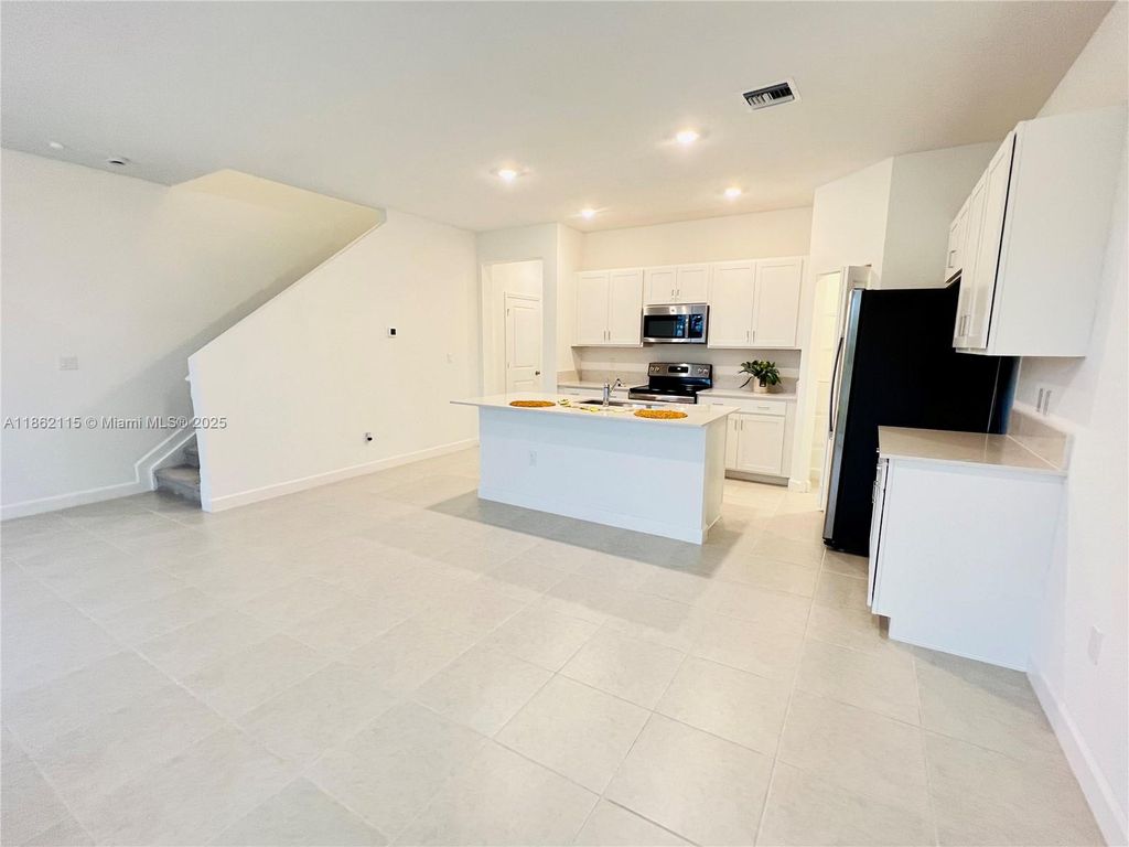 Photo of 6949 Harbours Edge Ave #6949, Lake Worth, FL 33467 (MLS # A11862115)