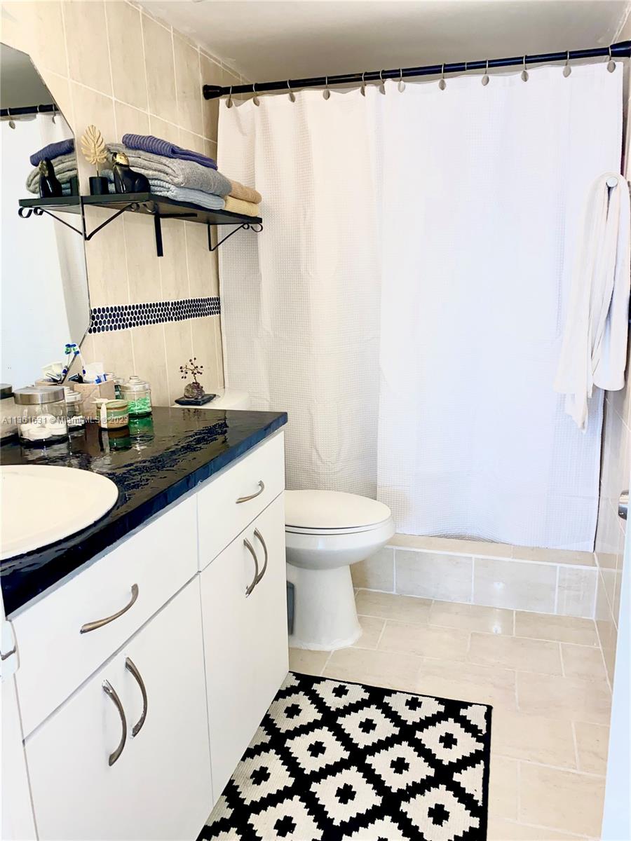 NORTHEAST PALMS CONDO - Residential