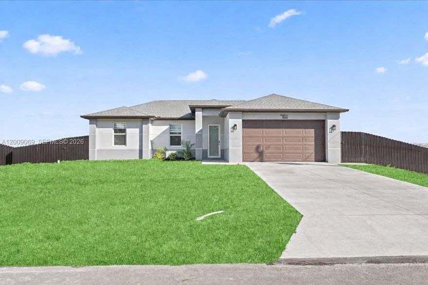 New Construction with SWIMMING POOL and PRIVACY FENCE. Check out this 3 bedrooms, 2 bathrooms with CITY WATER AND SEWER connected (ASSESSMENTS WILL BE PAID at Closing for full price offers) , IMPACT WINDOWS, OPEN CONCEPT kitchen with wood cabinets, QUARTZ countertops and STAINLESS STEEL kitchen appliances included. This home has an open floor plan, PORCELAIN TILES floors throughout the entire home and EPOXY GARAGE Floor. NOT IN A FLOOD ZONE. Schedule your showing today and come see this beautiful home! Very easy to show. Some pictures are virtually staged or from a sister house model, more pictures coming soon. Assessments or buyer's closing costs are negotiable. Don't miss this great opportunity!