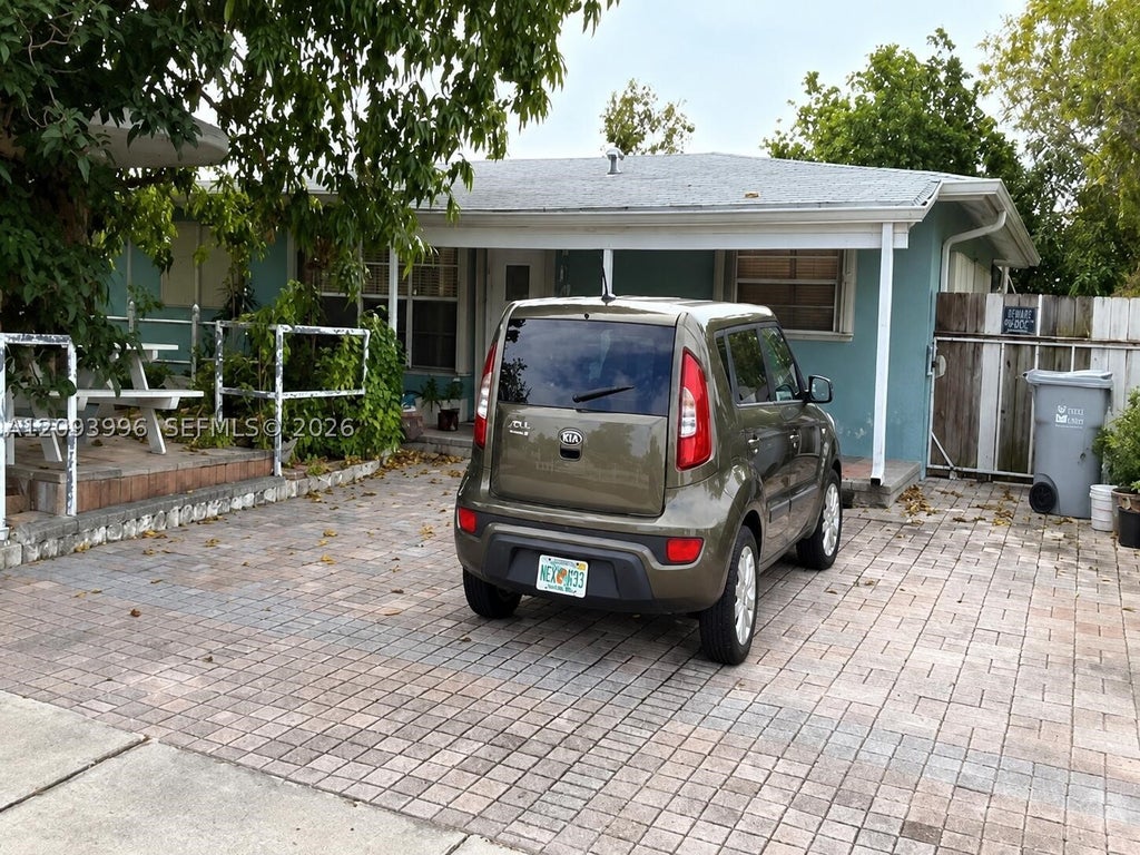 Photo of 140 NE 17th Ct, Pompano Beach, FL 33060 (MLS # A12093996)