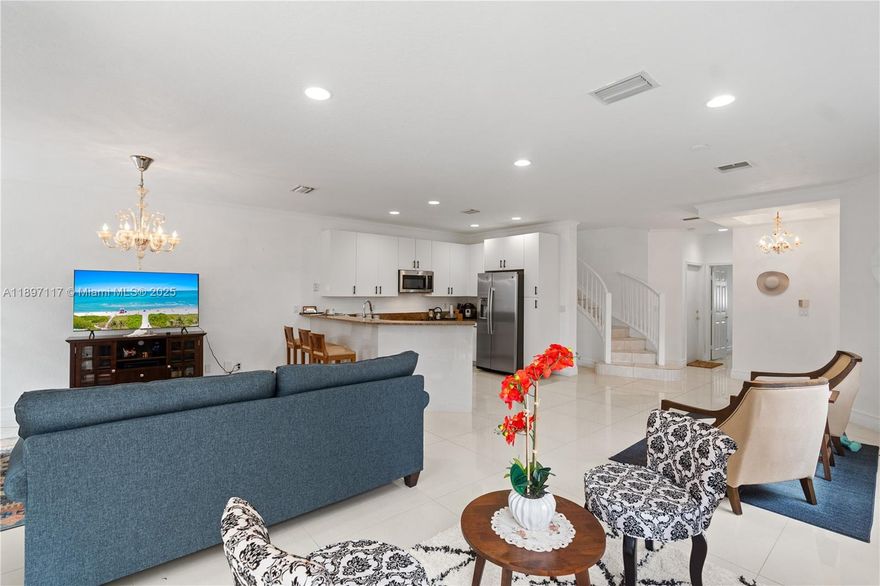 Welcome to Marina Cove at Harbor Village in Aventura! This rarely available 2-level townhome offers an open kitchen with spacious living and dining areas. The first floor features a bedroom, full bath, and garage access as well as plenty of windows and natural light. Upstairs, the spacious primary suite includes a large bathroom as well as a walk-in closet. The second level features two bedrooms, laundry room, and office space. Enjoy entertaining on the large private patio. Located in a gated community with 24/7 security, pool, sauna, and marina access. Perfectly situated near top-rated schools, parks, houses of worship, fine dining, Aventura Mall, and beautiful beaches—ideal for luxury living in the heart of Aventura.