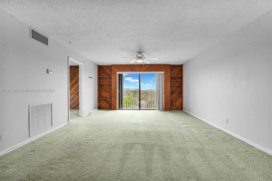 Coral Ridge Isles’ boutique Riviera Park top floor unit, bright 2BR/2BA - all age community. FRESHLY PAINTED WHITE NOV 25’.  One of the larger 2/2 in FTL (~1,280 SF) with abundant natural light and three walk-in closets. 2022 roof, 2024 elevators—great bones; bring your finishing touches. Impact windows in all bedrooms, shutters on the balcony slider for peace of mind. AC 2022, Water Heater 2017. Amenities: heated pool, tennis, clubhouse, BBQ areas, and ~550' of waterfront, optional boat slip rental (~$1.59/ft/mo). Pet-friendly. Superb location mins to Pompano & Lauderdale-By-The-Sea Beach, near Publix, quick to I-95. HOA ~$650/mo includes water, sewer, trash, basic cable, exterior insurance. A rare opportunity w/ strong investment potential plus optional dock space.