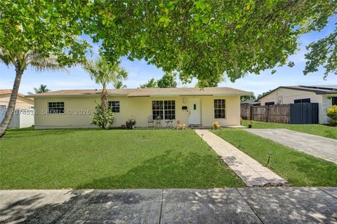 Photo of 102 NE 206th Ter, Miami Gardens, FL 33179 (MLS # A12074516)
