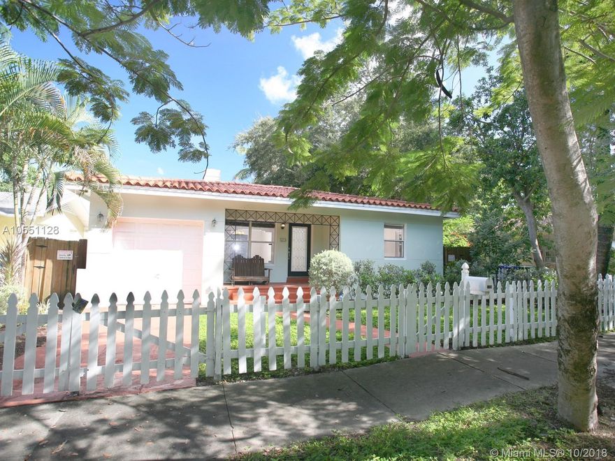 Charming Art Deco bungalow in historic Buena Vista East only blocks away from the booming Design District. This attractive home offers an original fireplace, large kitchen, formal dining, gated parking, an attached garage, and a spacious back yard with fruit trees. Enjoy urban neighborhood living walking distance to shops, cafes, restaurants, museums, and so much more.