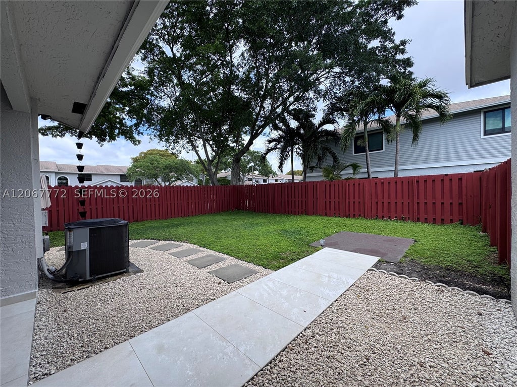 Photo of 10651 NW 1st St #10651, Pembroke Pines, FL 33026 (MLS # A12067772)