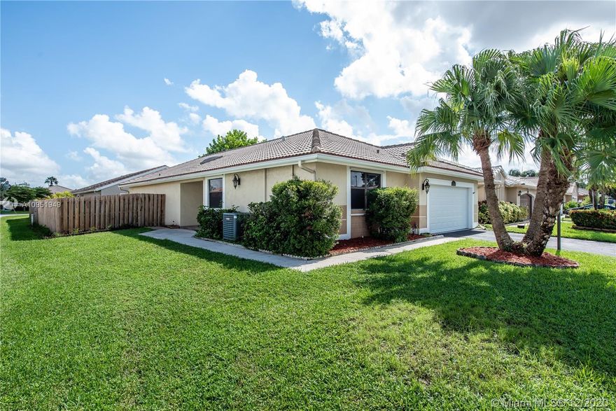 Don't miss this incredible and rare opportunity! Absolutely beautiful 3/2 corner lot, single family patio home, located in the sought after neighborhood of Waterford in Davie! Freshly painted with neutral colors throughout, vaulted ceilings with "knockdown texture" (no popcorn!), tile floors in all main living areas, new wood laminate floors in all bedrooms, large master bedroom with dual sinks in master bath, all wood privacy fence with nice size yard perfect for entertaining, complete hurricane shutters, 2 car garage, community pool, the list goes on and on! Ideally situated close to numerous parks (including an equestrian park), shopping, dining and major expressways! In this market, a beautiful home like this will not last long! Hurry! Don't Wait!