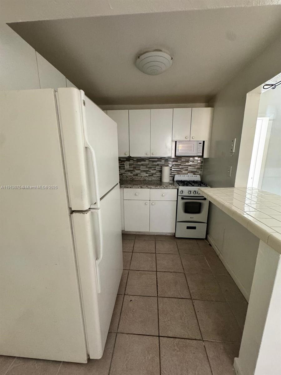 THE KENSINGTON CONDO - Residential Lease