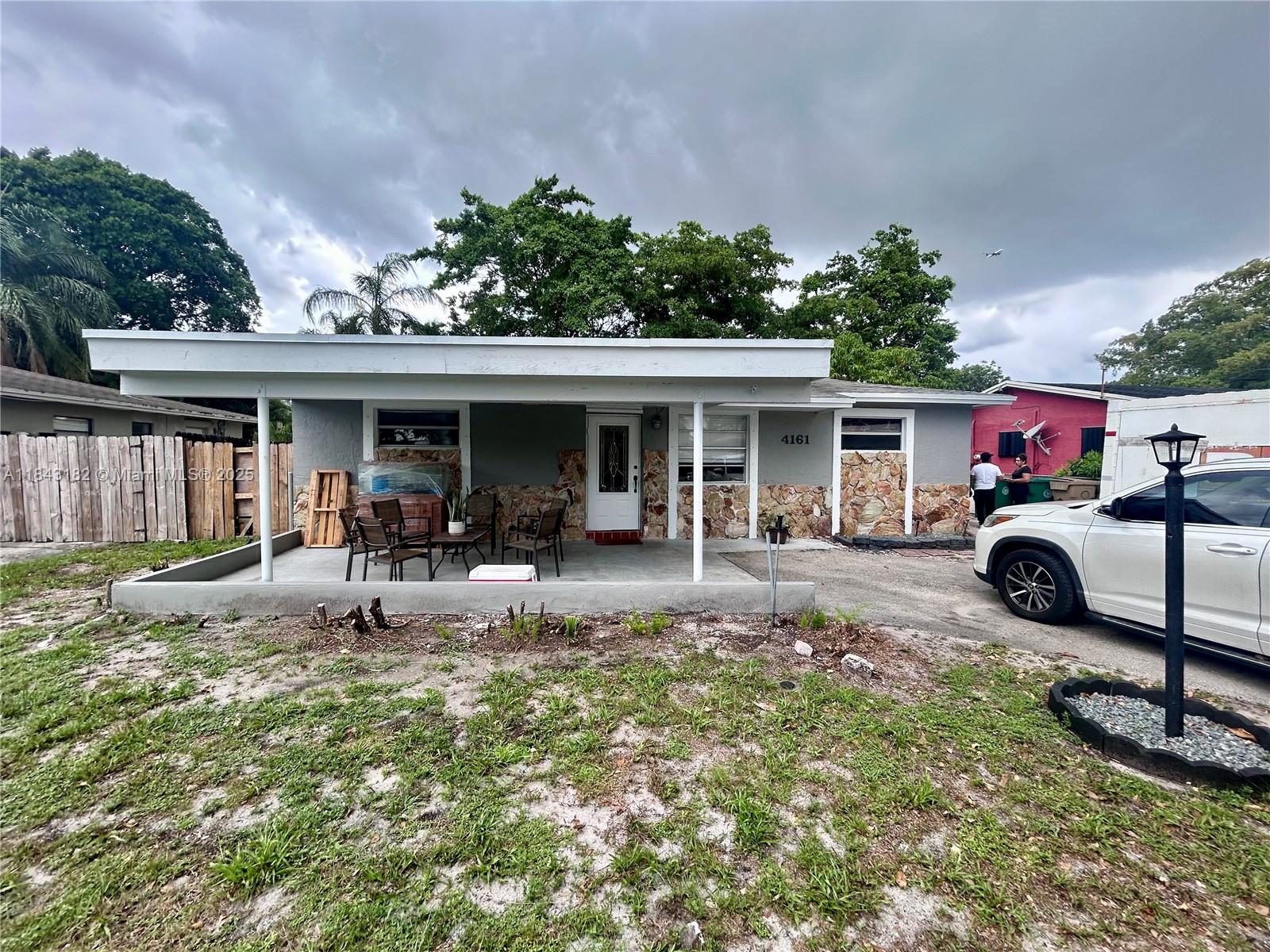 Welcome to your dream home in Davie Manor! This charming single-family home offers 3 bedrooms, 2 bathrooms, and a breathtaking lake view. The open layout creates a spacious, inviting atmosphere—perfect for entertaining. The kitchen features sleek Formica counters and black appliances for a modern touch. Easy-to-maintain tile flooring runs throughout the home. With no HOA fees, enjoy the freedom of homeownership without added costs. Just minutes from the popular Hard Rock Casino, this location blends convenience and entertainment. Whether you're a first-time buyer or seeking a cozy retreat, this is the perfect starter home. Don’t miss your chance to make it yours—schedule a showing today and start building memories in beautiful Davie!