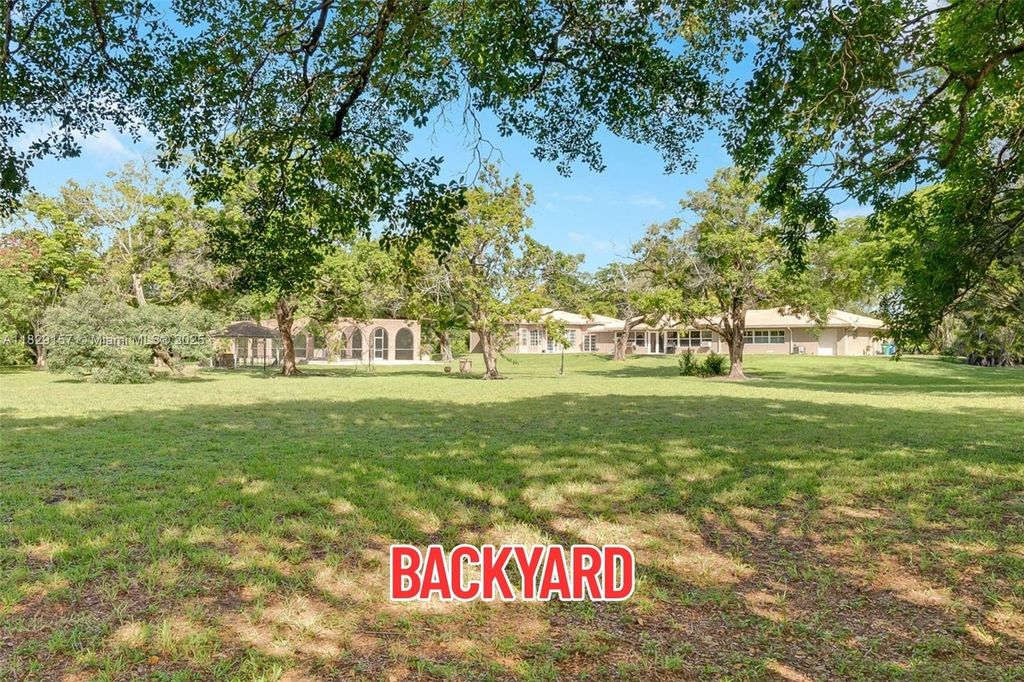 Photo of 9750 NW 45th Mnr, Coral Springs, FL 33065 (MLS # A11829157)