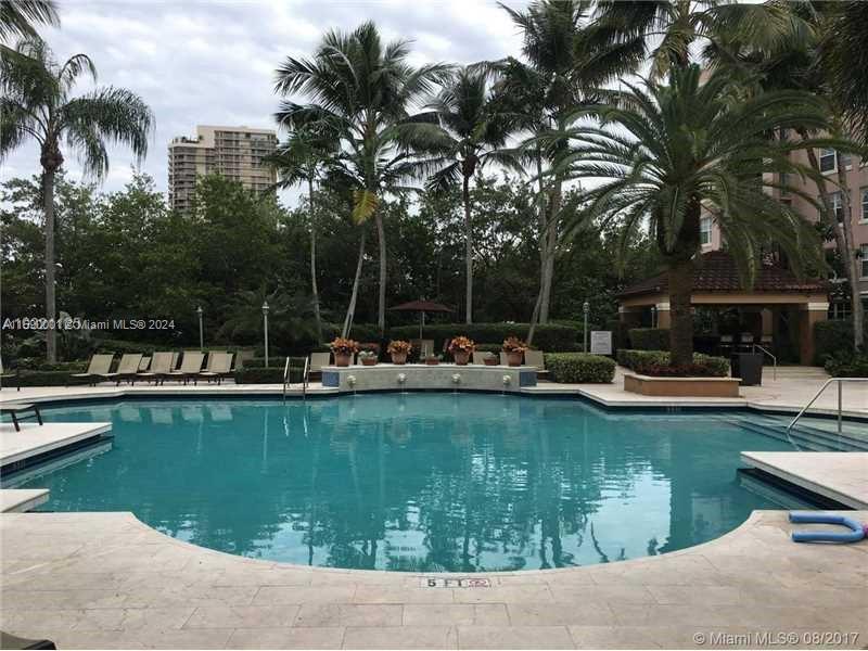 REDUCED! New appliances, freshly painted, beautifully updated 2/2 at the resort style community of the Yacht Club in the heart of Aventura. All laminate and tile floors, renovated bathrooms and kitchen with white quartz countertops. Washer and dryer in the unit. Across from the 3-mile fitness trail around the Turnberry golf course. Walk to Starbucks at JW Marriott hotel. Yacht club offers a tropical pool, jacuzzi, a state-of-the-art gym, tennis courts, basket ball courts, a business center, and a children's play area. A-rated school district. Management on site. Walking distance to Aventura mall, JW Marriott and Starbucks and Waterways shops. Just a short car ride to the nearest beach.