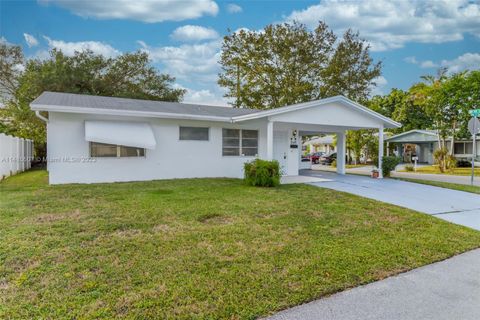 Photo of 4901 NW 25th Ter, Tamarac, FL 33309 (MLS # A11485507)