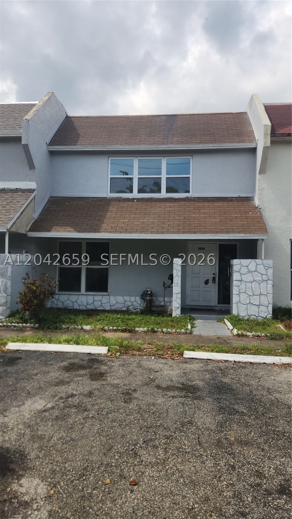 Photo of 6595 Boulevard Of Champions #6595, North Lauderdale, FL 33068 (MLS # A12042659)