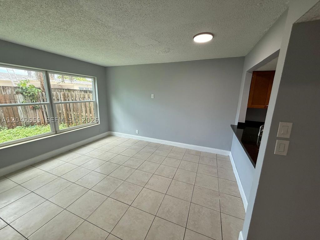 Photo of 6595 Boulevard Of Champions #6595, North Lauderdale, FL 33068 (MLS # A12042659)