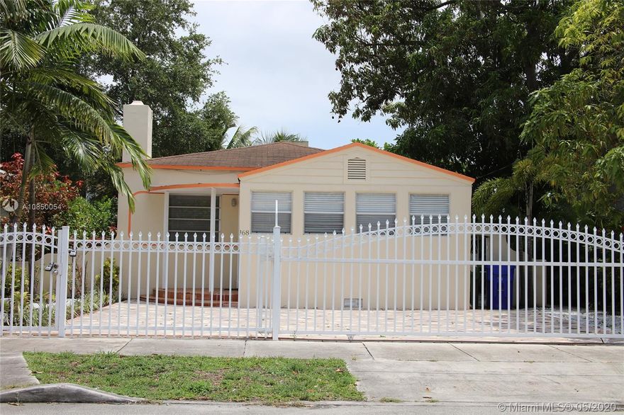 Steps away...Design District, Wynwood, Downtown Miami, Midtown and beaches.  Great 3/2 SFH with a separate studio apartment in the rear. CAC in the Main house, split system in the studio. Shared washer/dryer. Gated front with ample parking for 3 vehicles. Updated kitchen/baths and large kitchen. Great extra income potential. 3d tour  https://my.matterport.com/show/?m=5mSisVrMzGs&mls=1