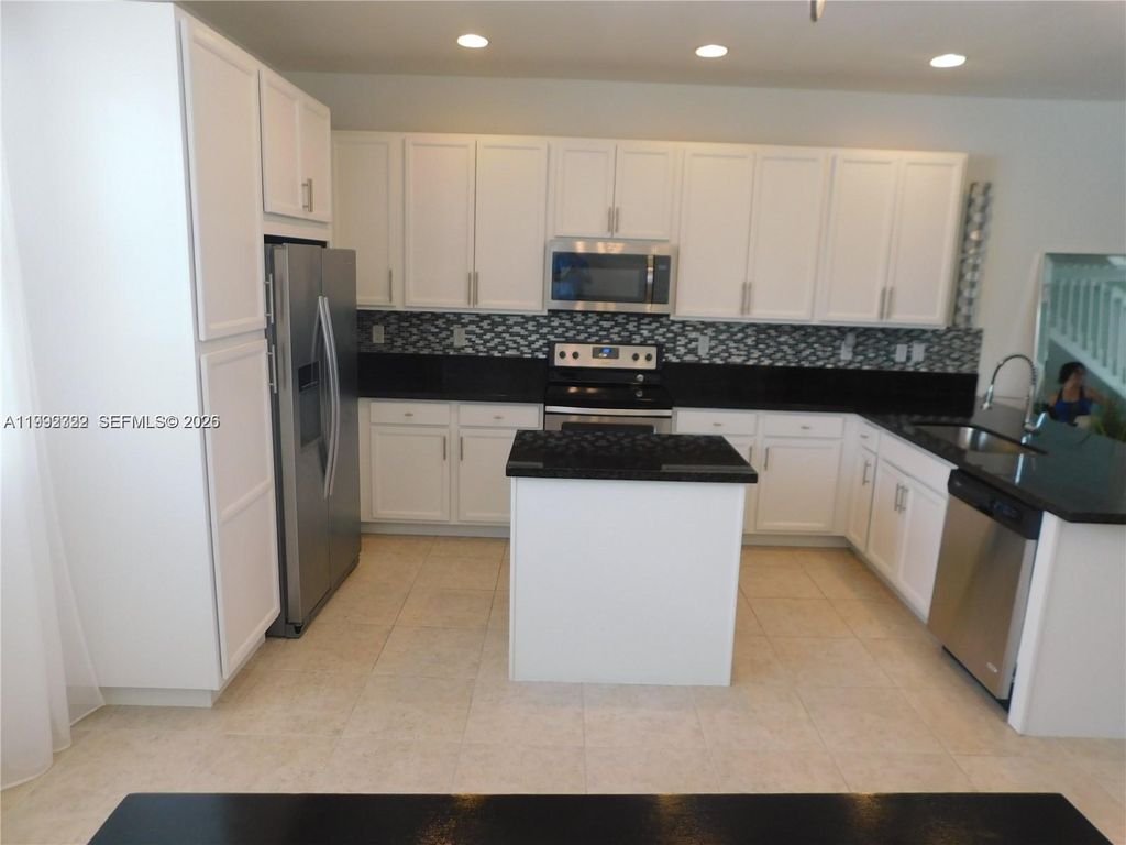 Photo of 11317 SW 15th St #11317, Pembroke Pines, FL 33025 (MLS # A11992322)