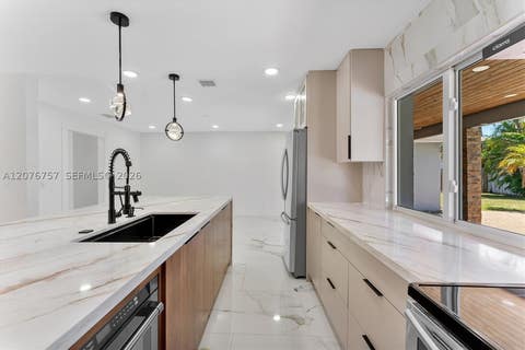 Tiny photo for 7220 NW 10th Pl, Plantation, FL 33313 (MLS # A12076757)