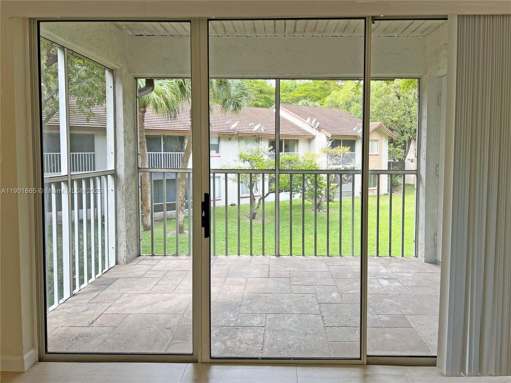 Photo of 14015 SW 91st Ter #14015, Miami, FL 33186 (MLS # A11901865)