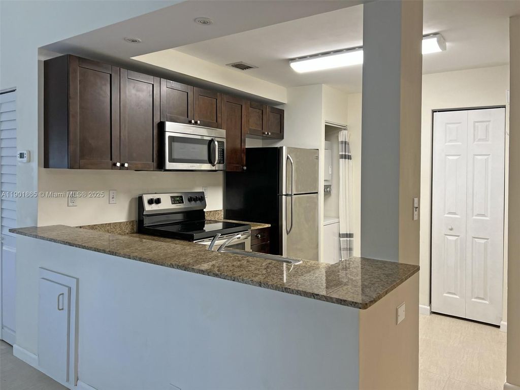Photo of 14015 SW 91st Ter #14015, Miami, FL 33186 (MLS # A11901865)