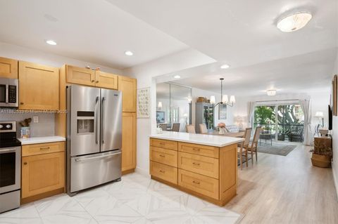 Photo of 611 S Hollybrook Dr #205, Pembroke Pines, FL 33025 (MLS # A11882533)