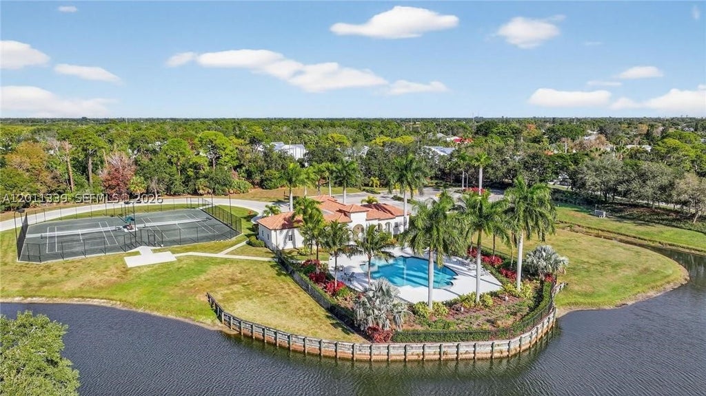 Photo of 265 SE Via Sangro, Port St Lucie, FL 34952 (MLS # A12011339)