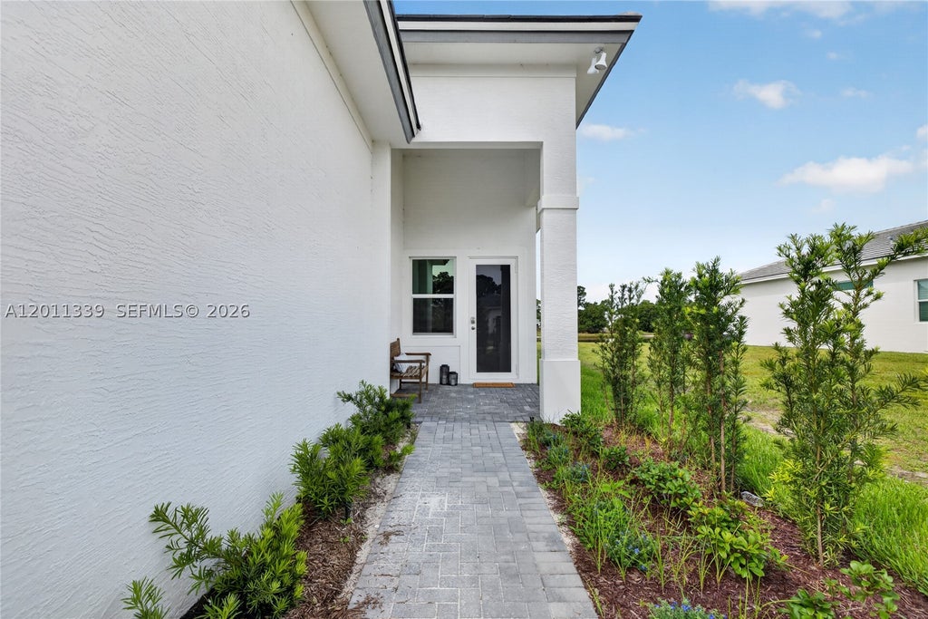 Photo of 265 SE Via Sangro, Port St Lucie, FL 34952 (MLS # A12011339)