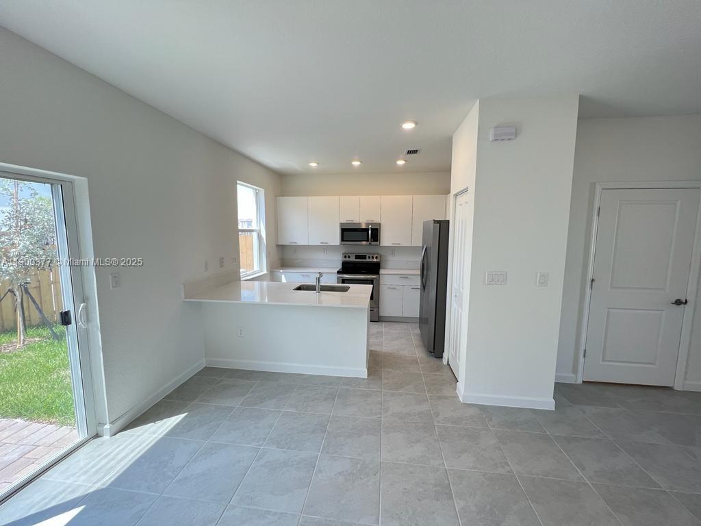 View photos, virtual tours, details... 12958 NW 23rd Pl