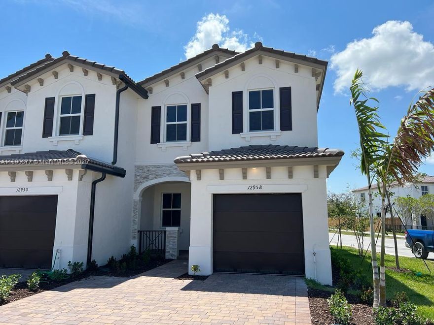 Lowest price in the area!!! Built in 2023, this bright corner unit offers 3 bedrooms, 2.5 baths, a modern kitchen, washer & dryer, and parking for 4 cars. Located in a gated community with resort-style amenities — pool, gym, clubhouse, and dog park. Perfect for living or investing, with low HOA and excellent rental potential in a fast-growing Miami area. VACANT WITH LOCKBOX
