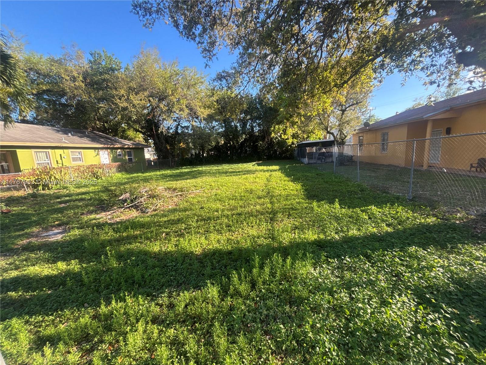 "Rare opportunity to own a prime residential lot in a sought-after neighborhood. This spacious 0.15-acre lot offers flat, buildable land, perfect for custom home development. Located in a quiet, established area with easy access to schools, shopping, and major highways. Surrounded by mature trees, the property provides both privacy and convenience. Zoned for residential use, utilities are available nearby. Don't miss this opportunity to create your dream home in a desirable location. Call today for more details!"