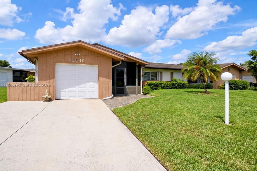 This beautiful villa in an active 55+ community, offering the perfect blend of comfort and style. The spacious floor plan features that enhances an open feeling, with lake views visible from the main living areas. The main areas, a modern kitchen with updated appliances, a spacious dining area, living room and large family room and two bedrooms with two full bathrooms. All freshly painted interiors.  Step out to a serene patio ideal for outdoor entertaining. A garage with a laundry area with hookups for washer/dryer and a driveway with extra parking spaces. The community is pet-friendly, with nice landscaping enhancing the curb appeal. A newly renovated ballroom clubhouse, cards room, library, meeting room, pool area, gym with bathroom area for showering, adds to the vibrant lifestyle.