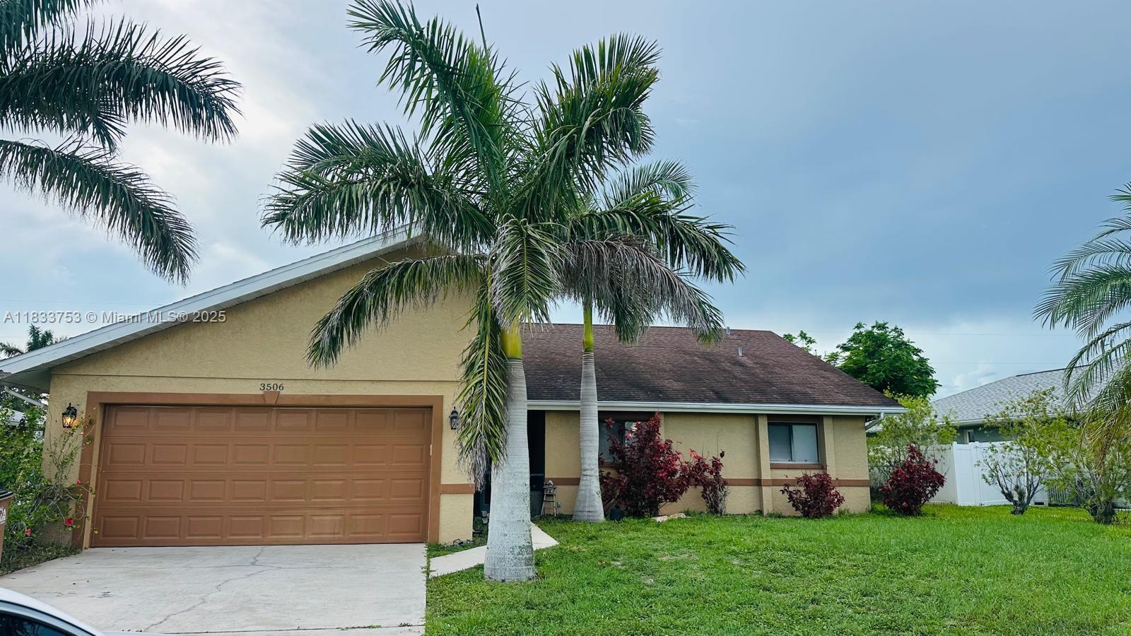This charming 3-bedroom, 2-bath home is full of character and ready for your personal touch! Located in a desirable area of SE Cape Coral, it features vaulted ceilings with wood beams, tile flooring throughout, and a kitchen with granite countertops and warm wood cabinetry. The bathroom is clean and functional, offering space for future updates. Step outside to enjoy a screened lanai and spacious backyard—perfect for relaxing or future outdoor projects. Additional highlights include a 2-car garage and city water with all assessments paid. With no HOA and not located in a flood zone, this property offers flexibility and peace. Conveniently close to parks, schools, shopping, dining, and Cape Coral’s downtown entertainment district. Seller is motivated—schedule your showing today