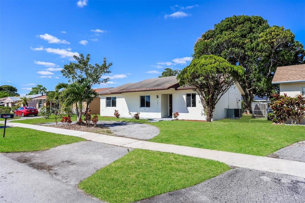 Photo of 7801 SW 6th Ct, North Lauderdale, FL 33068 (MLS # A12012779)