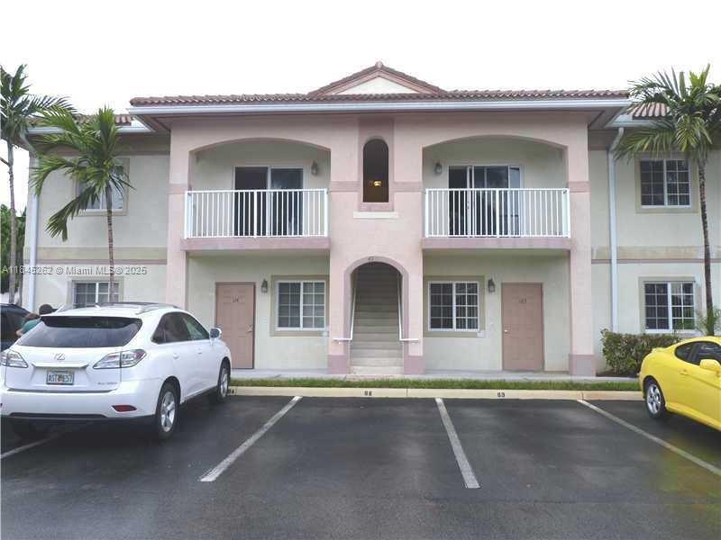 SPACIOUS 2/2 UNIT IN QUIET GATED COMMUNITY. UNIT FEATURES TILED FLOORS THROUGHOUT, LARGE BALCONY/PATIO AREA, HUGE OPEN FLOOR PLAN, WALK-IN CLOSETS, 2 ASSIGNED PARKING SPACES RIGHT OUTSIDE THE UNIT DOOR, WASHER/DRYER IN UNIT. CONVENIENT LOCATION. NO AGE RESTRICTION. AVAILABLE FOR LEASES STARTING ON 09/01/25 OR BEYOND.