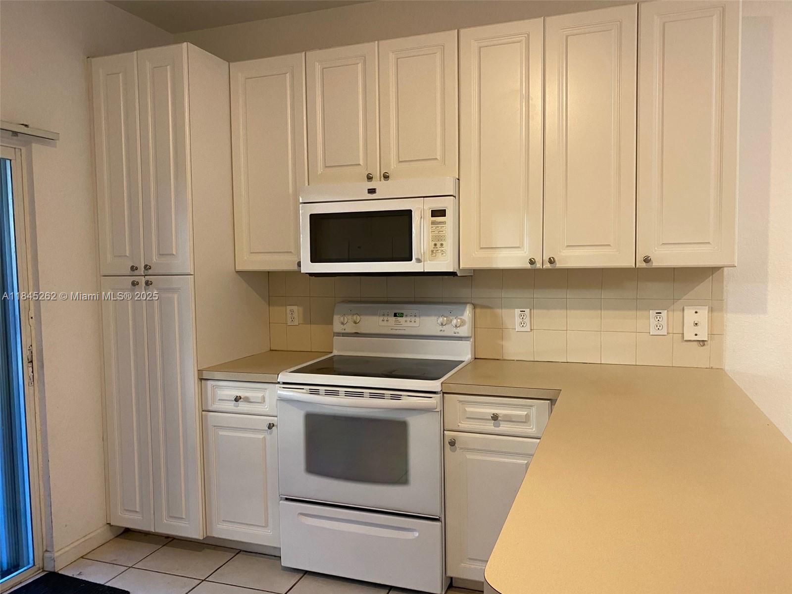 SPACIOUS 2/2 UNIT IN QUIET GATED COMMUNITY. UNIT FEATURES TILED FLOORS THROUGHOUT, LARGE BALCONY/PATIO AREA, HUGE OPEN FLOOR PLAN, WALK-IN CLOSETS, 2 ASSIGNED PARKING SPACES RIGHT OUTSIDE THE UNIT DOOR, WASHER/DRYER IN UNIT. CONVENIENT LOCATION. NO AGE RESTRICTION. AVAILABLE FOR LEASES STARTING ON 09/01/25 OR BEYOND.