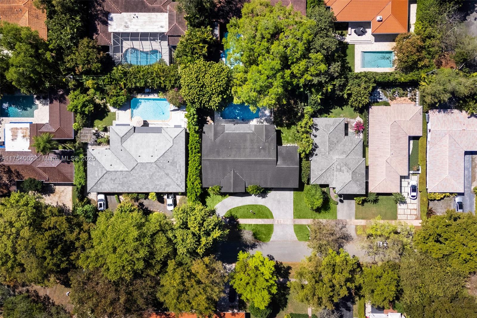Seize the opportunity to build your dream home on this expansive 12,000 SF lot in the heart of Coral Gables or transform the existing 3,146 SF residence, built in 1968. This prime property, set in a prestigious neighborhood, offers a rare chance to create a custom home while starting with a well-appointed 5-bedroom, 2.5-bath structure. Featuring a formal living and dining room, a breakfast area, a double-car garage, and a saline pool, the existing home provides a strong foundation for renovation or expansion. Whether you choose to reimagine the current space or build anew, this sought-after location places you near top-rated schools, lush parks, and the best of Coral Gables living.