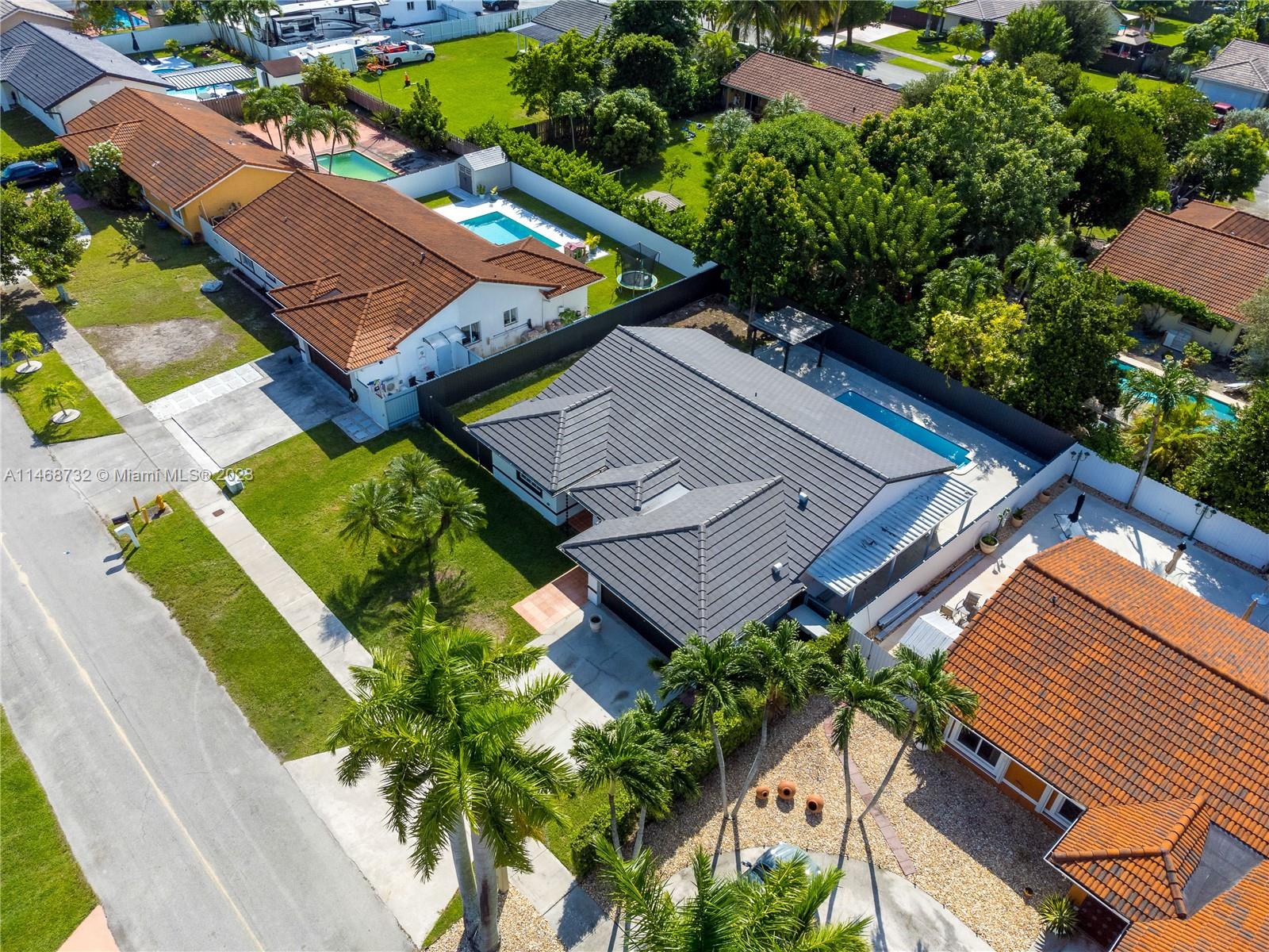 Beautiful pool home, fully remodeled with 4 beds and 2 baths with space for RV or Boat and NO ASSOCIATION. Garage efficiency currently rented.