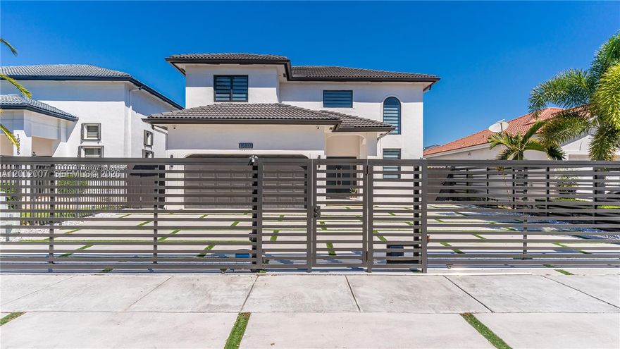 If you are in the market for a newly remodeled home where you can swim in a gorgeous modern saltwater pool this is your home! This stunning 3 bedroom 2.5 bathroom home features beautiful porcelain floors through out the entire home. As you enter the home you will see the gorgeous high ceiling family room. Modern ceiling high kitchen cabinets with stainless steel appliances. Impact windows and doors through out the home. Beautiful double shower his and hers master bathroom with marble floors. Modern heated smart saltwater pool and spa. Outdoor kitchen with refrigerator, sink and grill covered with a aluminum large pergola. Oversized driveway with aluminum fence which include two motorized gates. Pool Maintanence included.