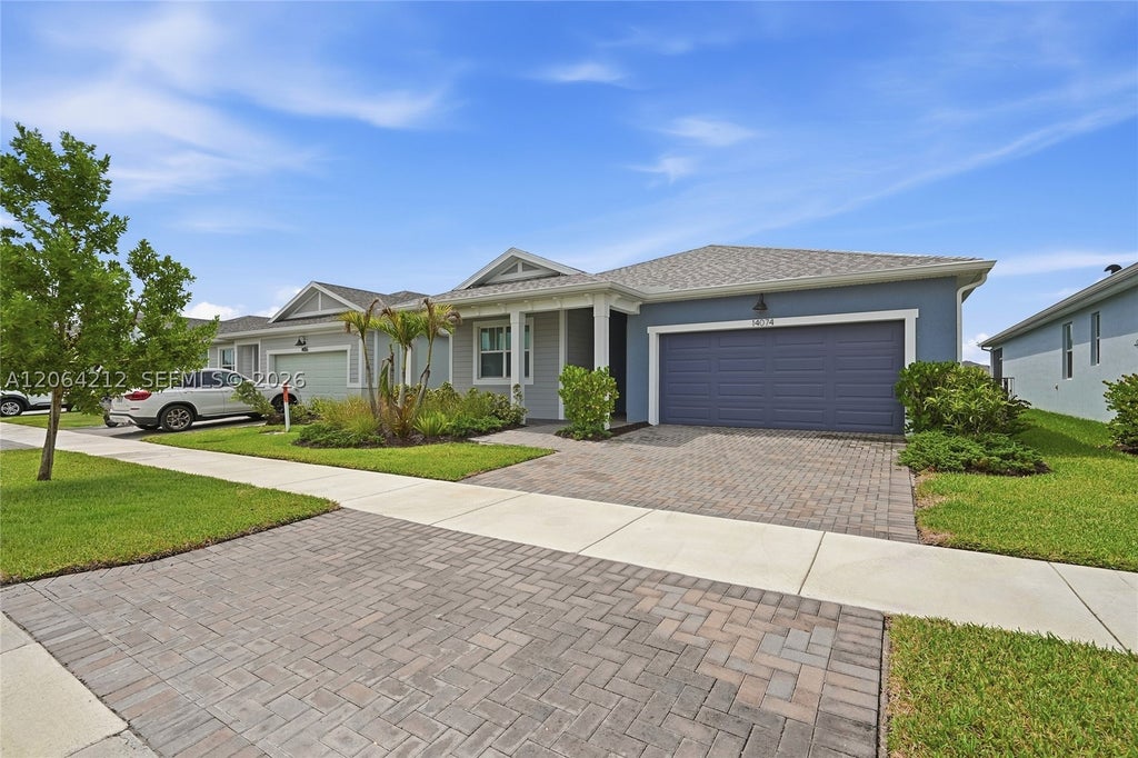 Photo of 14074 SW Surina St, Port St Lucie, FL 34987 (MLS # A12064212)