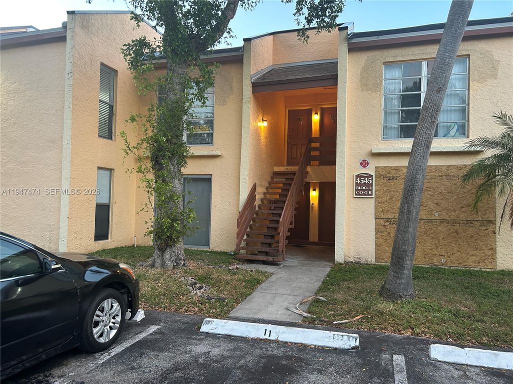 Photo of 4545 Treehouse Ln #H, Tamarac, FL 33319 (MLS # A11947474)