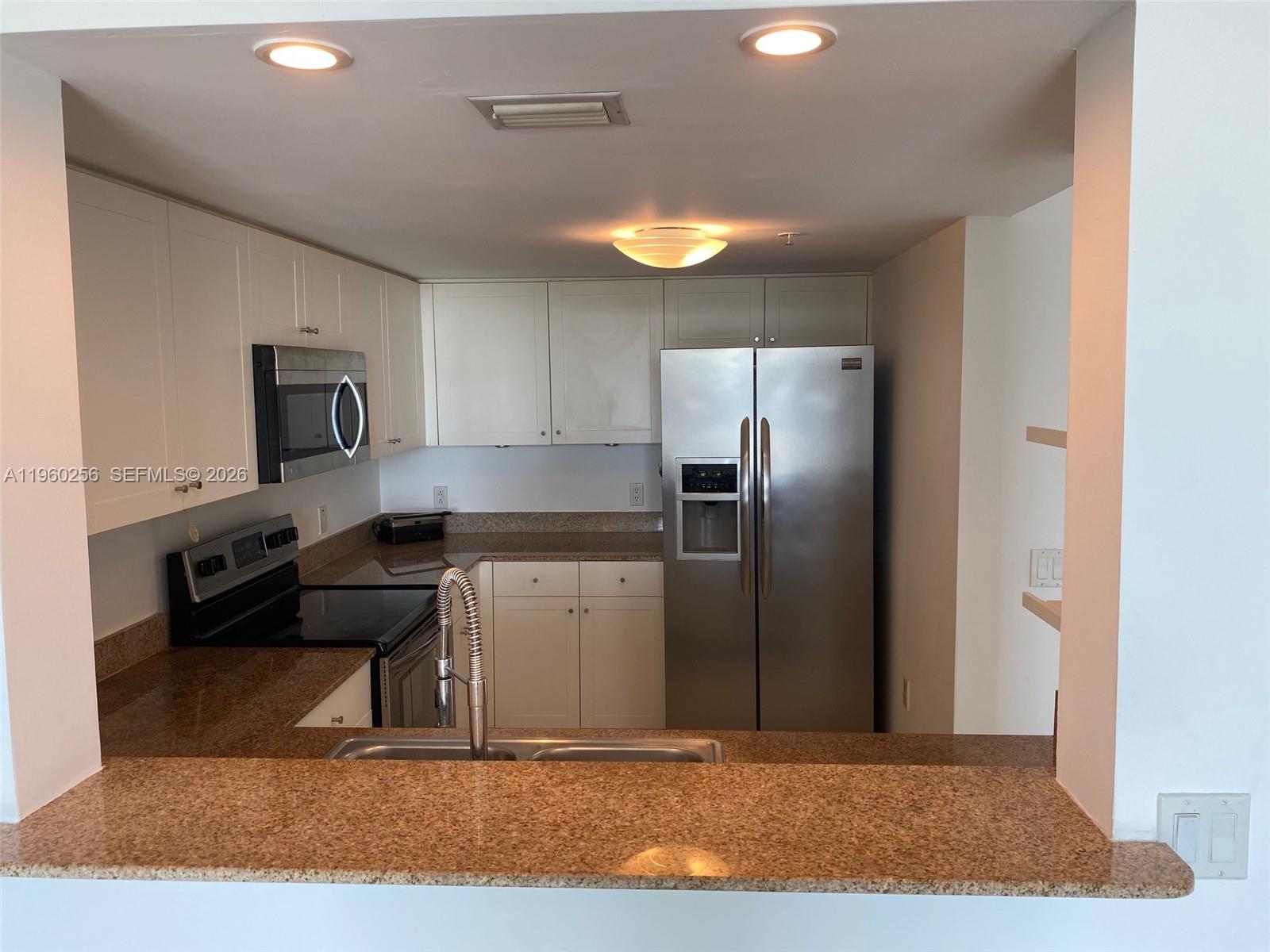 DOUGLAS PLACE CONDO - Residential